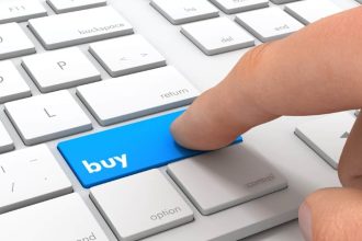 Finger clicking a button marked