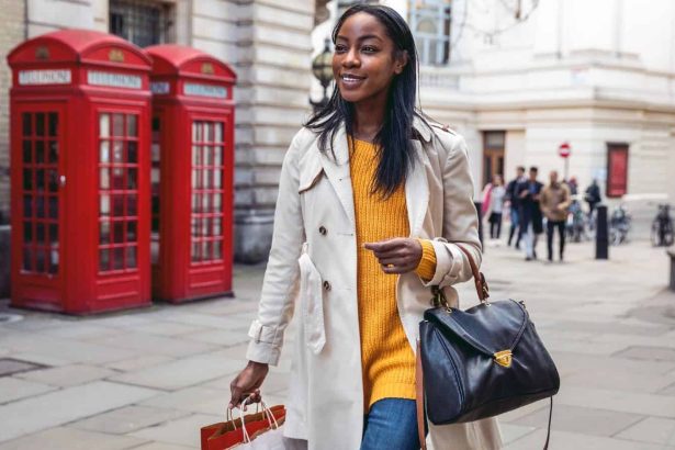 Young black woman walking in Central London for shopping