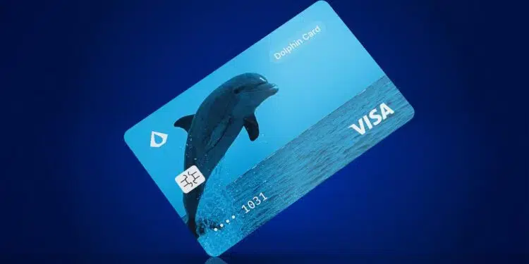 Tarjeta Visa de color azul con el logo de un delfín.