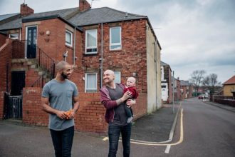 Fathers Walking With Their Little Boy