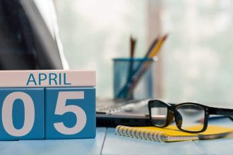 Calendar showing the date of 5th April on desk in a house